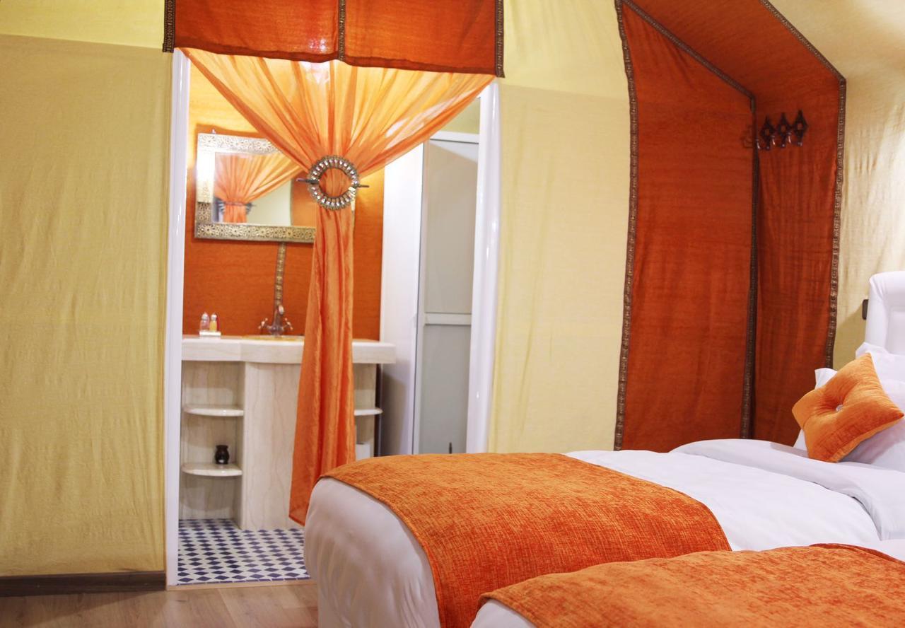 Отель Sahara Sky Luxury Camp Мерзуга Экстерьер фото